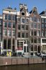 Herengracht 249 tijdens restauratie: 'Stadsherstel herstelt ook hier de stad' (© Walther Schoonenberg)