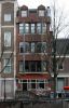 Amsterdamse School-gevel Herengracht 307 (tegenwoordig 303) (© Walther Schoonenberg)