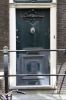 Gesneden deur met kuif in Lodewijk XV-stijl (© Walther Schoonenberg)